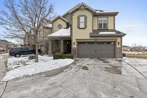 View of front property featuring a garage