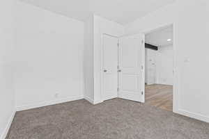 View of carpeted spare room