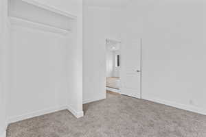 Unfurnished room featuring carpet floors