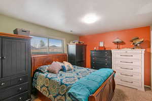 Bedroom featuring carpet