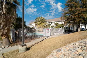 View of yard with a community pool