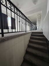 Stairway to the loft area and bedrooms.