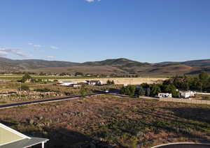 View of mountain feature with a rural view