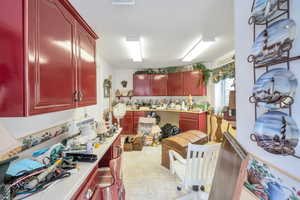 Kitchen featuring light tile patterned floors