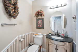 Bathroom with vanity and toilet