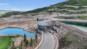 View of swimming pool featuring a water and mountain view