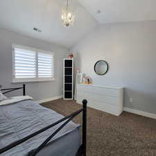 Bedroom 2 with vaulted ceiling