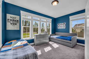 View of carpeted bedroom