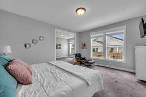 View of carpeted primary bedroom