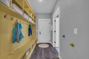 Mudroom featuring light LVP floors