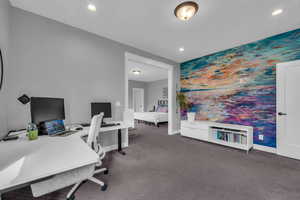 View of carpeted office/sitting room in primary bedroom