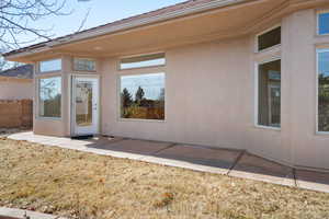 Entrance to property with a patio