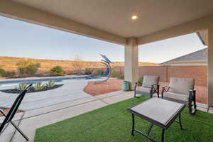 View of yard featuring a fenced in pool and a patio area