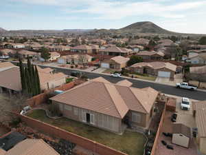 Birds eye view of property with a mountain view