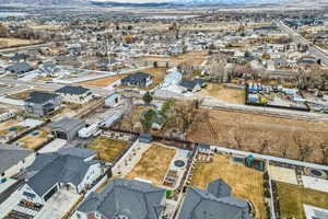 Birds eye view of property with a mountain view