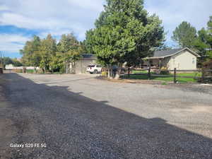 View of front of property featuring a garage