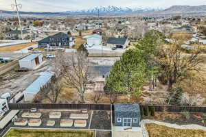 Birds eye view of property with a mountain view