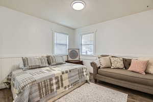 Bedroom featuring dark hardwood / wood-style floors