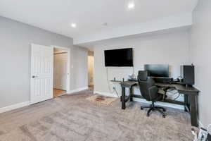 View of carpeted home office