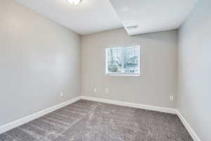 View of carpeted spare room