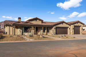 View of front of property with a garage