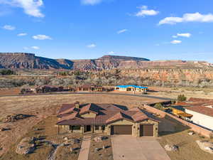 Birds eye view of property with a mountain view