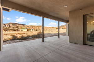 View of patio with a mountain view