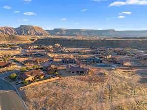 Birds eye view of property with a mountain view