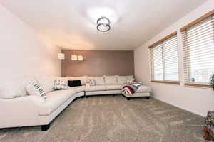 Living room with carpet floors