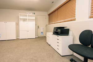 Great room/Office area featuring walkout entrance.