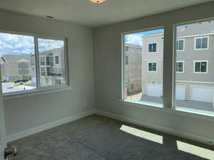 Unfurnished room featuring carpet floors