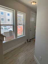 Interior space featuring a healthy amount of sunlight and light hardwood / wood-style floors