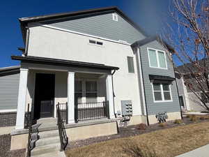 View of front of property featuring a porch