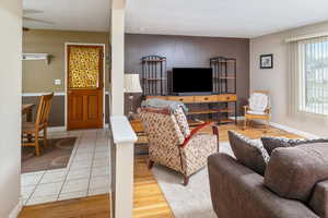 Living room with hardwood / wood-style floors