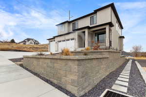 View of front of property with a garage