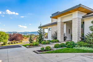 View of property exterior with a mountain view