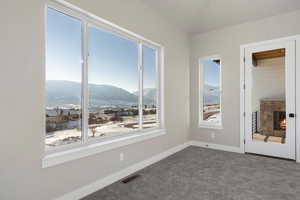 Master bedroom with mountain views and access to the covered patio