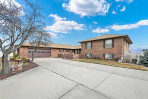 Split level home featuring a garage