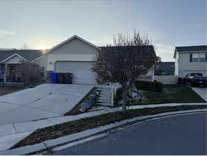 View of front of house with a garage