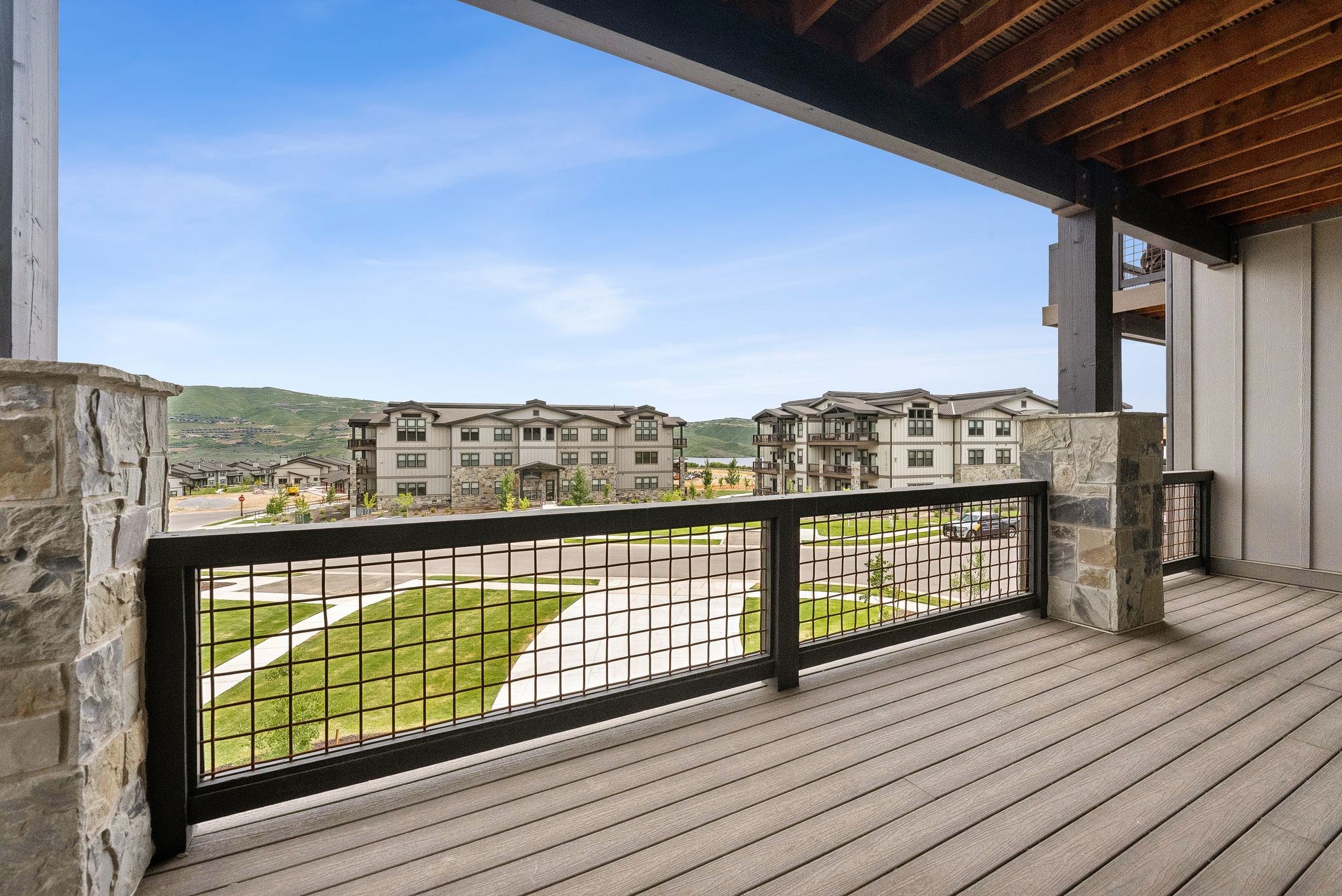 Wooden deck featuring a residential view