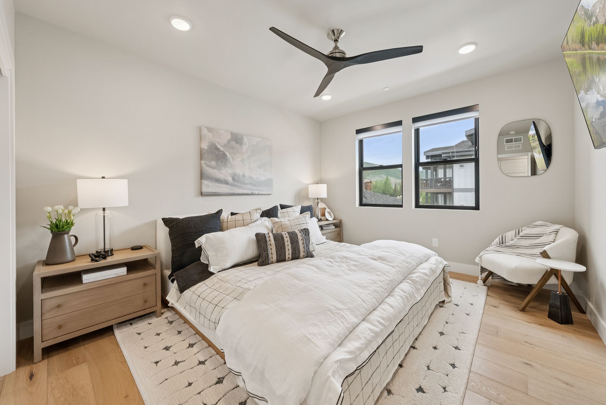 Bedroom with light wood-type flooring, recessed lighting, and ceiling fan