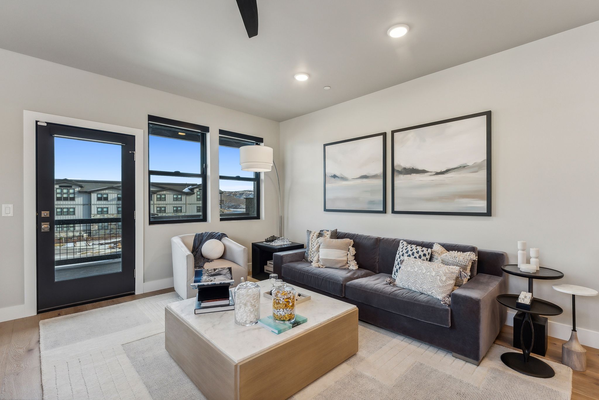 Living room with light hardwood / wood-style flooring