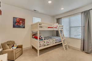 Bedroom featuring carpet floors