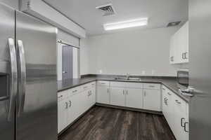 Clubhouse kitchen with ample space for hosting large gatherings.