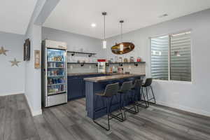 Savor this wet bar area while enjoying a game of pool.