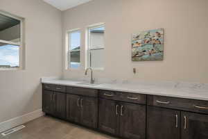 Light and bright laundry room. A great amount of space for you to work with.