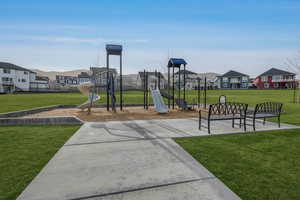 Wonderful play area featuring expansive open lawn for yard games.