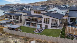 Rear view of house. What a great outdoor living space!