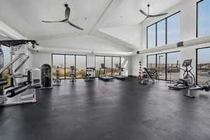 Spacious gym offering stunning views of the city and mountains.