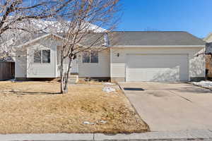 Ranch-style home with a garage